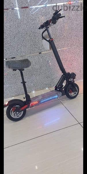 scooter brand new& fixing available hom door 15