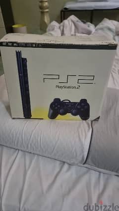 Slim ps2 complete in box price 30 bd