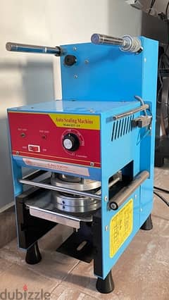 Auto Sealing Machine - مكينة تغليف الاكواب 0