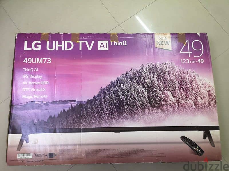 LG UHD TV 49 inch/123cm with box and wall bracket 2