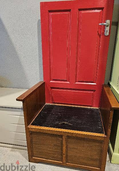 Antique Bahraini Door transformed into a chair with storage 1