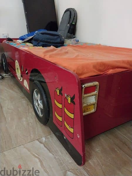 car bed with mattress and a small cupboard for free, only 10 bd 1