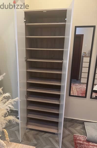 excellent condition 33 pair shoe cabinet 1