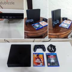 PS4 Slim Excellent condition with 1 Original controller and 2 cds 0