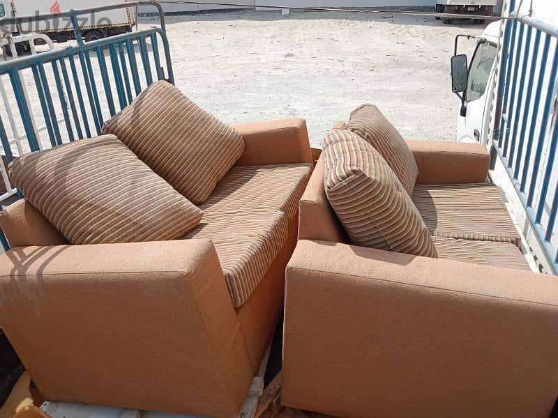 2 seater sofa 2 piece all good condition WhatsApp 37722714 0