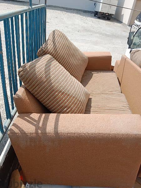 2 seater sofa 2 piece all good condition WhatsApp 37722714 2