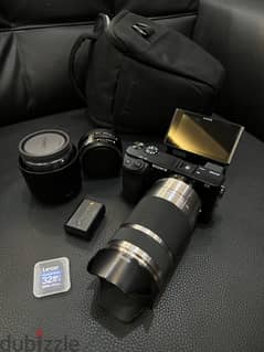 Sony A6100 mirrorless camera with 3 kit lenses