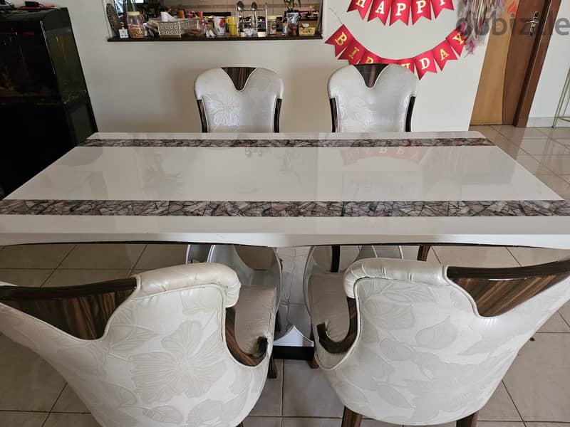 Marble top dining table for sell with 4 chairs 1