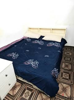 Queen size bed with medicated mattress and Two door wooden wardrobe 0