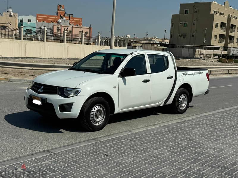 Mitsubishi L200 2015 white 1