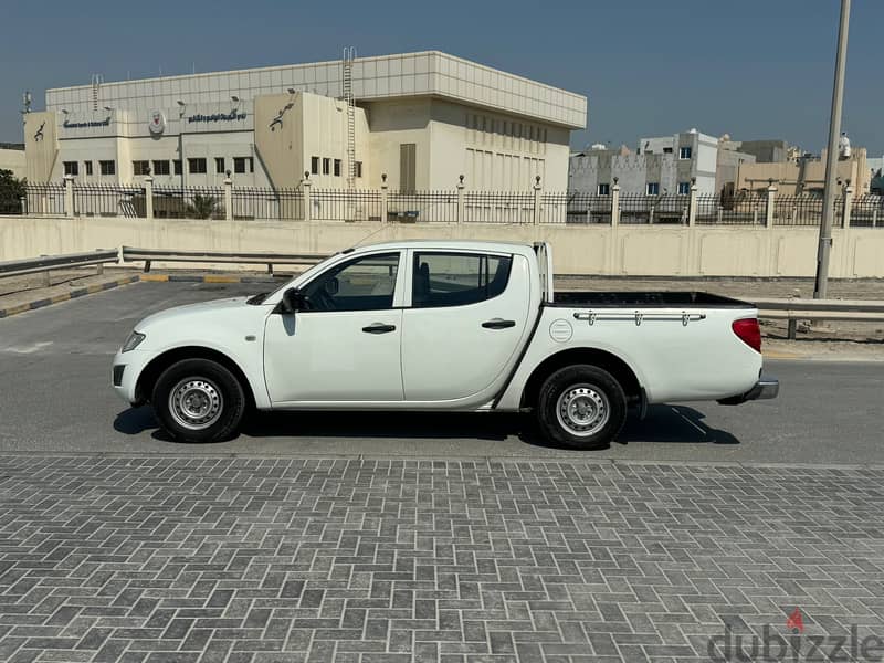 Mitsubishi L200 2015 white 2