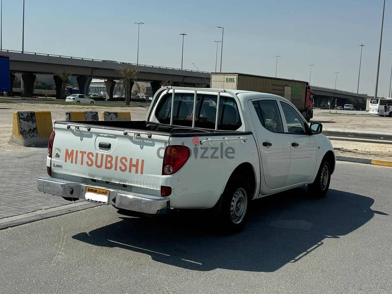 Mitsubishi L200 2015 white 6