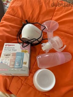 breast milk pump with storage bags شفاط لحليب الام مع اكياس للحليب 0