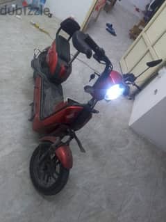 scoter with charge