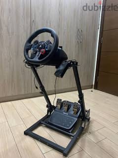 logitech G29 steering wheel including a stand for it 0