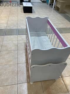 Pink baby bed