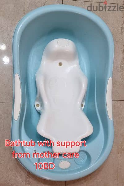 kid's rocking dolphin and bathtub for sell 1