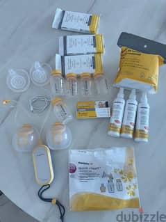 medela breast pump with accessories 0