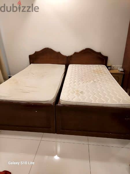 2 single smart beds along with new mattresses 1