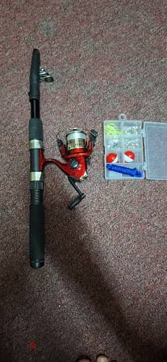 new fishing rod with some accessories 0