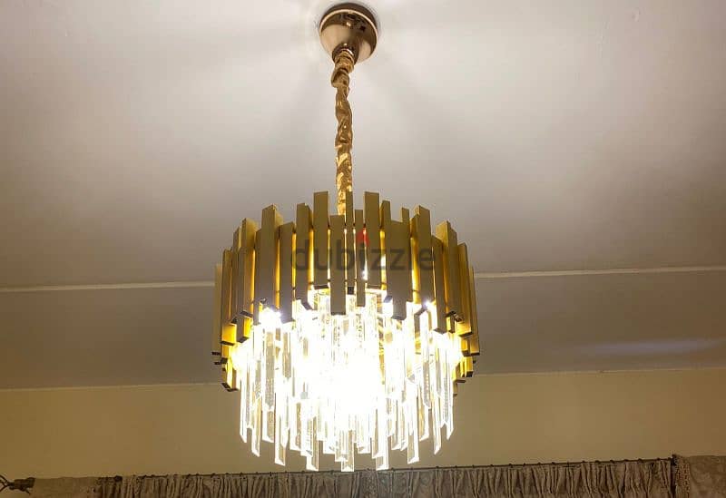 two used chandeliers 1