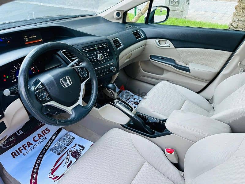 Honda Civic 2014 model. Full option with suroof. 19