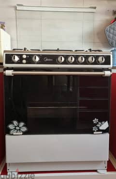 Midea Range (stove + oven) 0