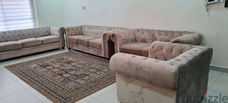 9 seater sofa . . . excellent condition  beautiful biedge colour 1