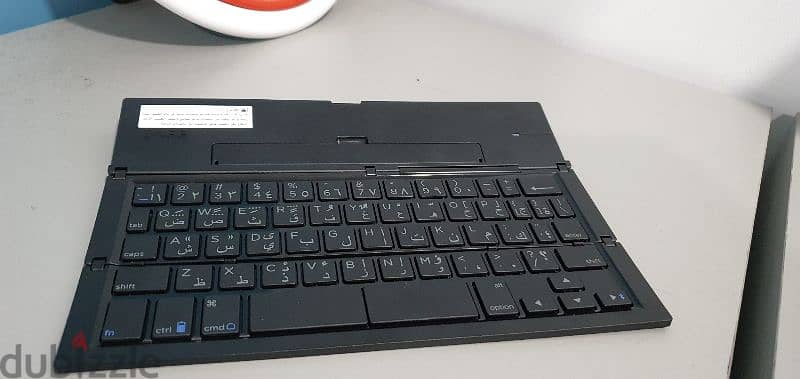 Portable Bluetooth Keyboard لوح مفاتيح (كيبورد محمول) يعمل بالبلوتوث د 0