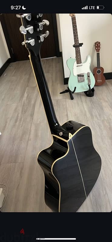 Washburn black acoustic guitar 2