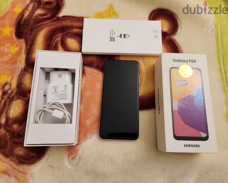 Samsung Galaxy F04 4GB ram 64GB storage with box and charger no 1