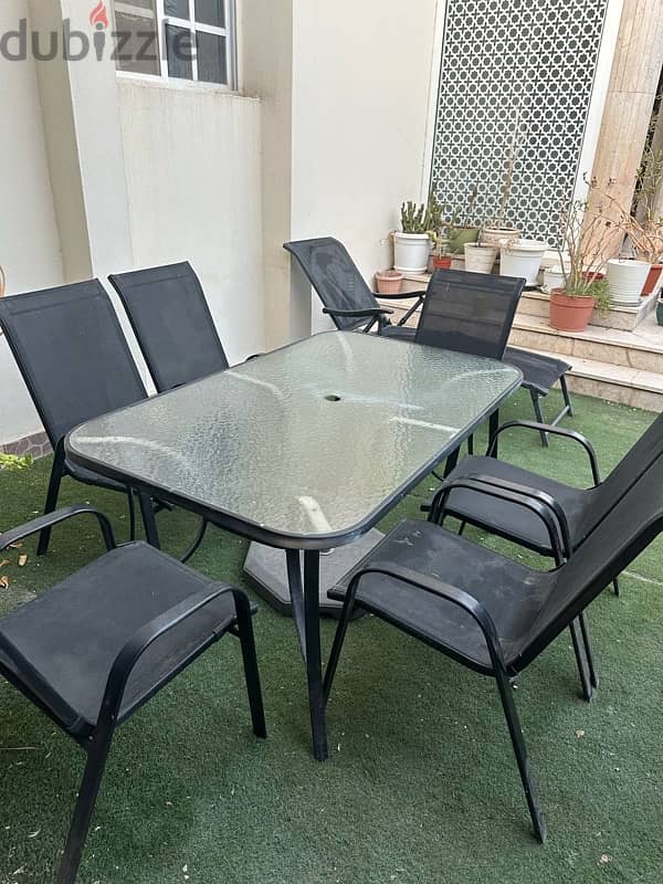 table with 6 chairs and swing 2