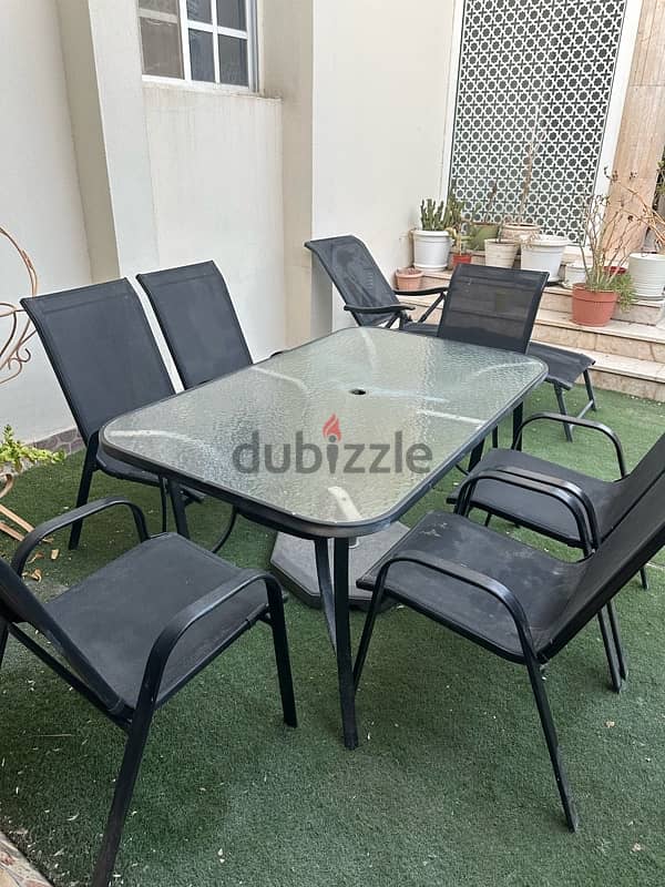 table with 6 chairs and swing 3