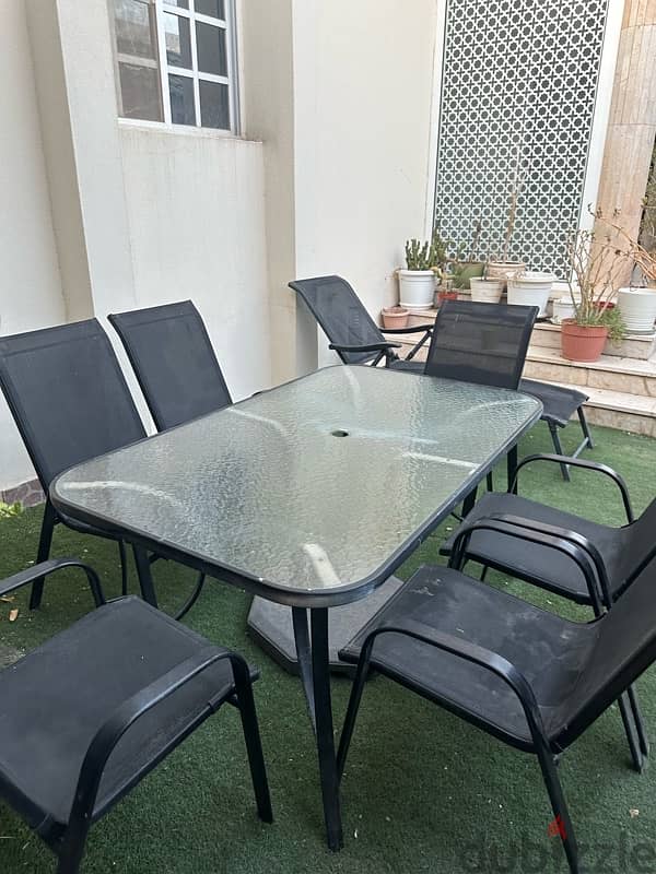 table with 6 chairs and swing 4