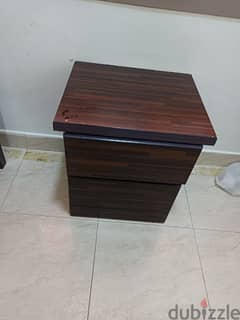 small desk or drawer of hard wood