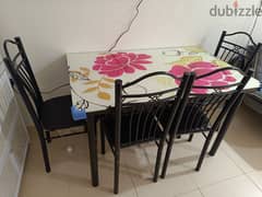 4 seater toughened glass dining table with chairs