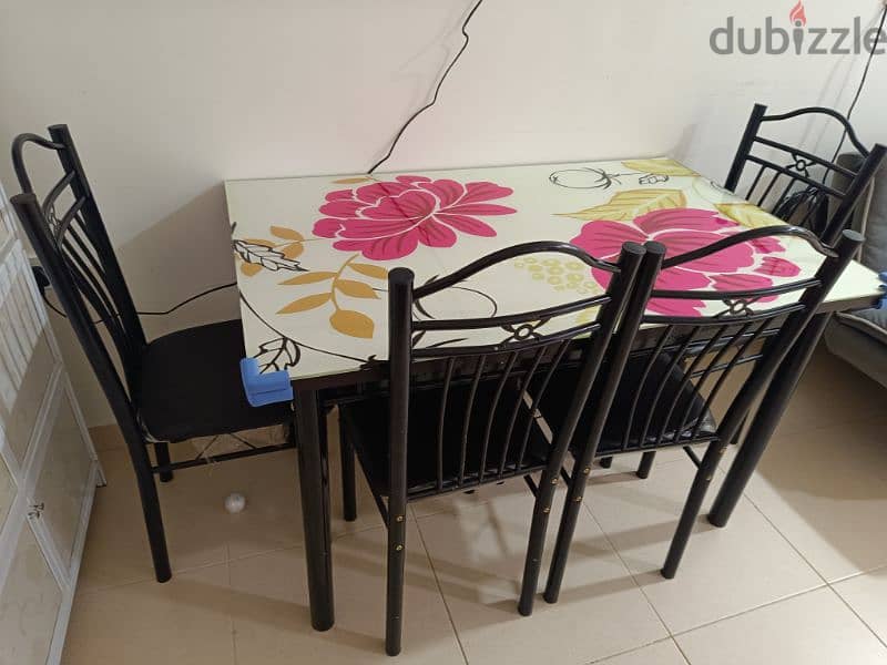 4 seater toughened glass dining table with chairs 0