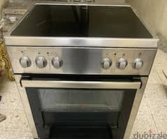 Electric cooker with oven