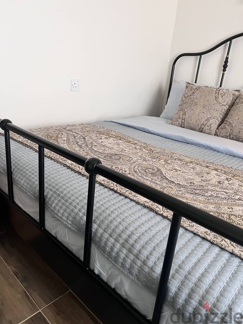 Used IKEA bed frame and mattress 1