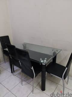 Glass dining table with 6 chairs for sale 0