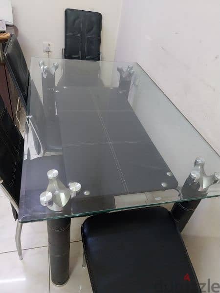 Glass dining table with 6 chairs for sale 1