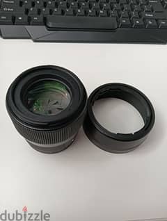 Sigma 56mm F1.4 used 0