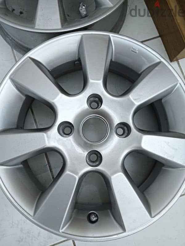 nissan original alloy wheel for sale with nut 1