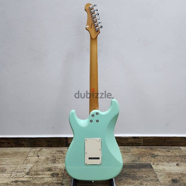 Used like new JET Guitars JS-400 HSS, in sea foam green. 4