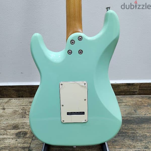 Used like new JET Guitars JS-400 HSS, in sea foam green. 5