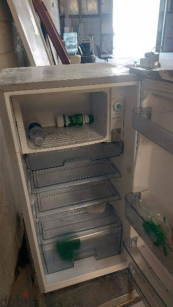 Good condition fridge one month werenty 1