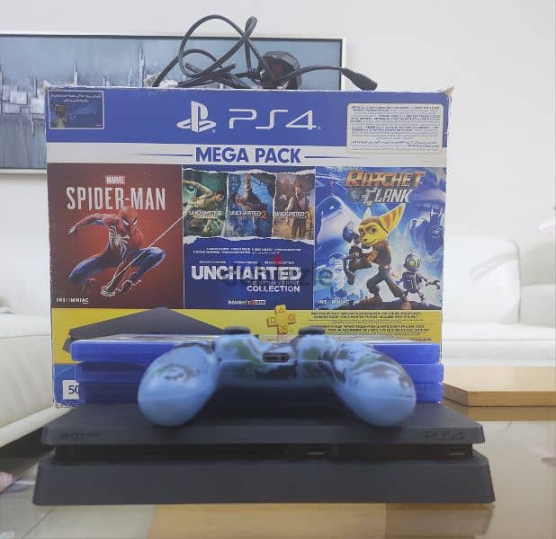 Playstation 4 500 GB with 6 games 2 controllers and used headset 0