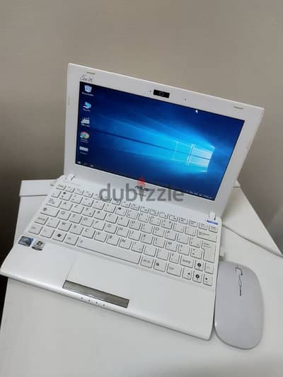 لابتوب ASUS صغير ب ٨ دينار