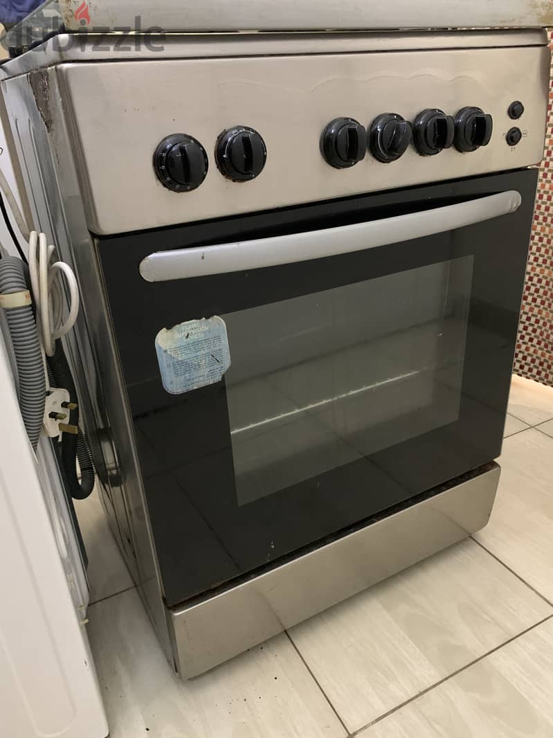 Refrigerator and gas cooker 1