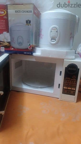 used microwave & new rice cooker for sale 3